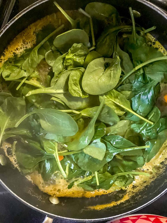 Adding spinach to vegetable soup