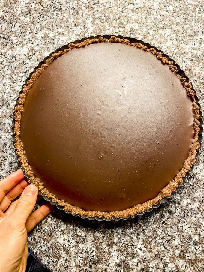 Chocolate tart with a date and roasted hazelnut crust