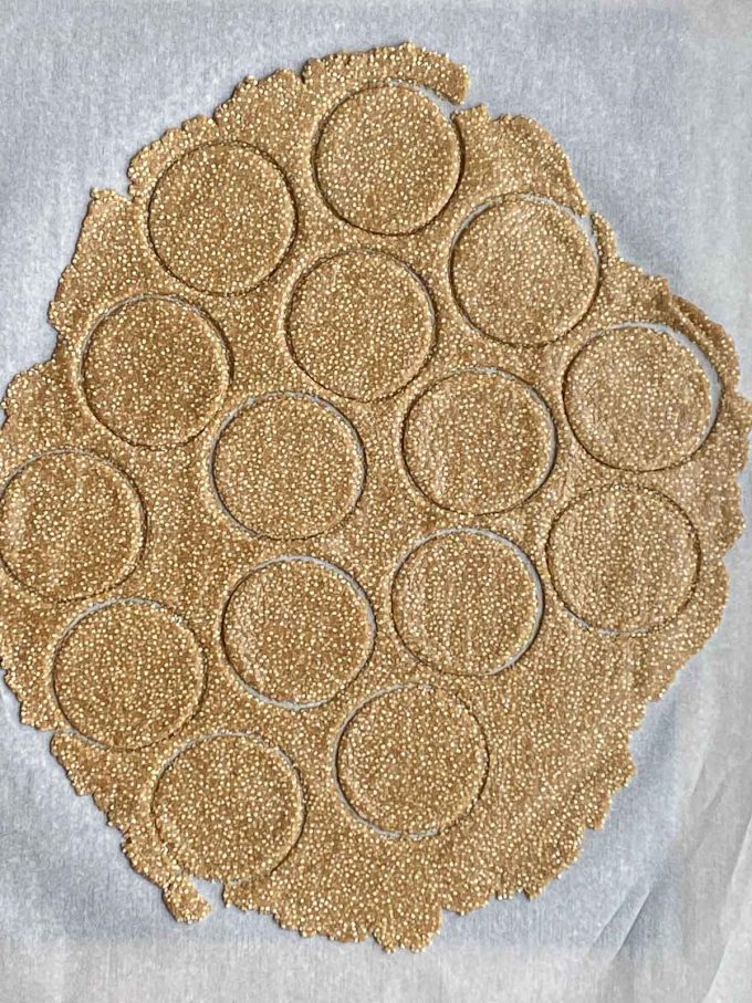 Round circles cut out of cookie dough
