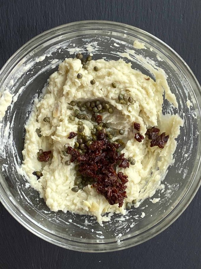 Adding capers and sundried tomatoes to the mashed potatoes 