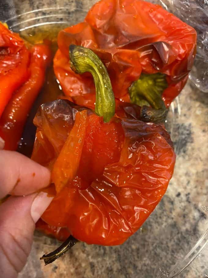 A view of roasted red pepper being peeled