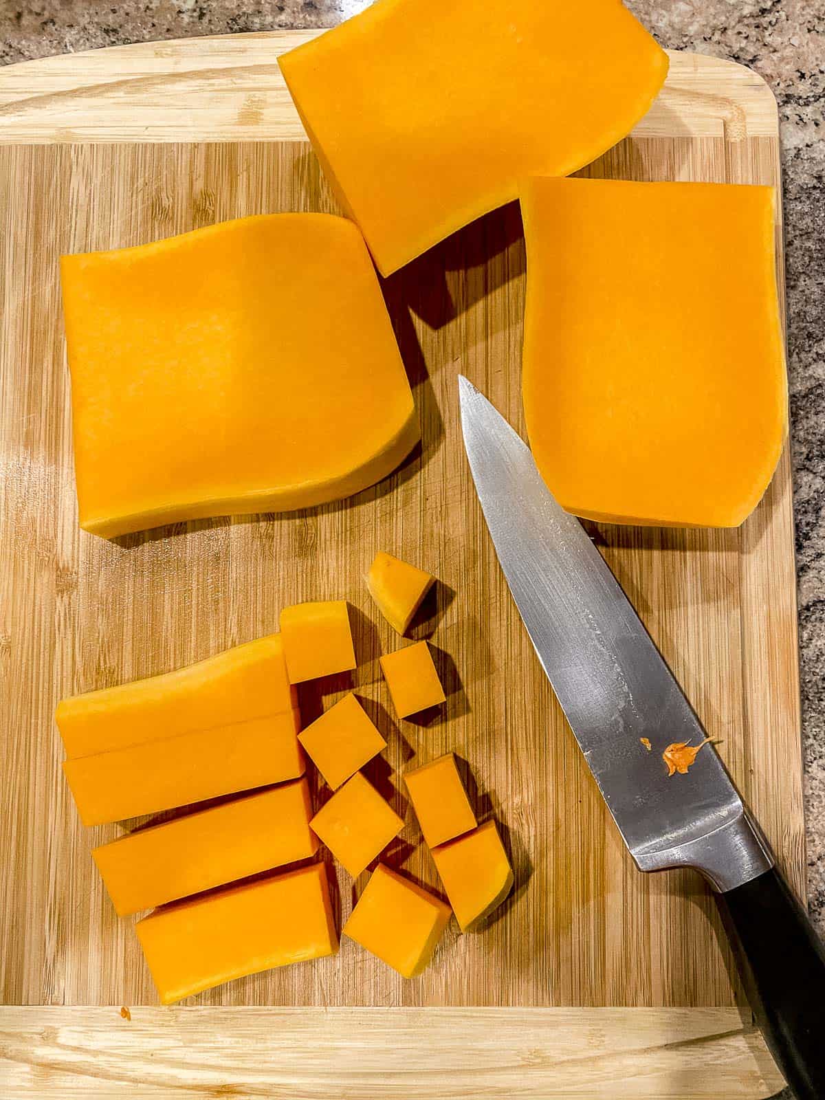 Different cuts of butternut squash on a cutting board