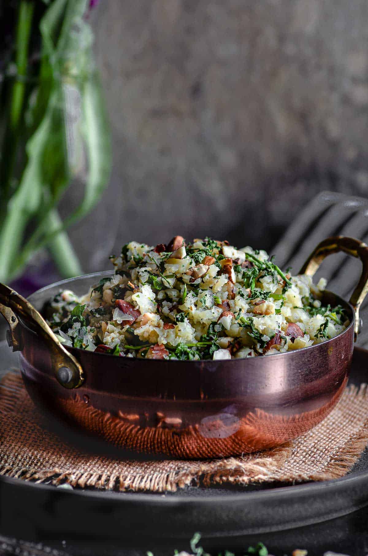 A close up side view of a bowl of cauliflower rice