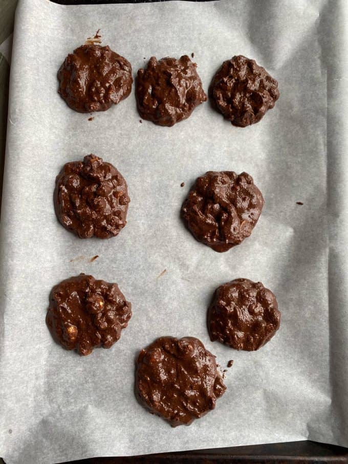 chocolate cookies on a baking sheet ready to be baked