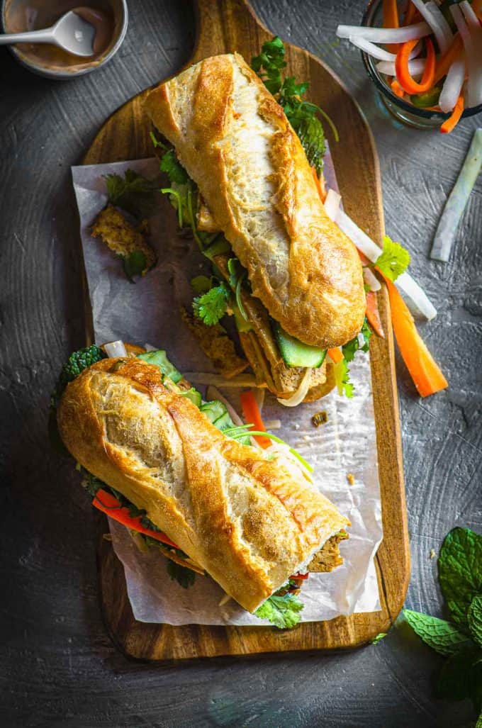 An overhead view of two bahn mi sandwiches