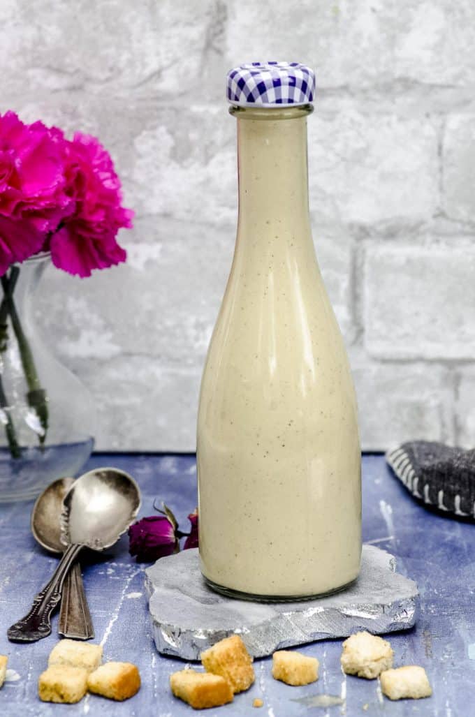 a bottle of homemade vegan caesar dressing