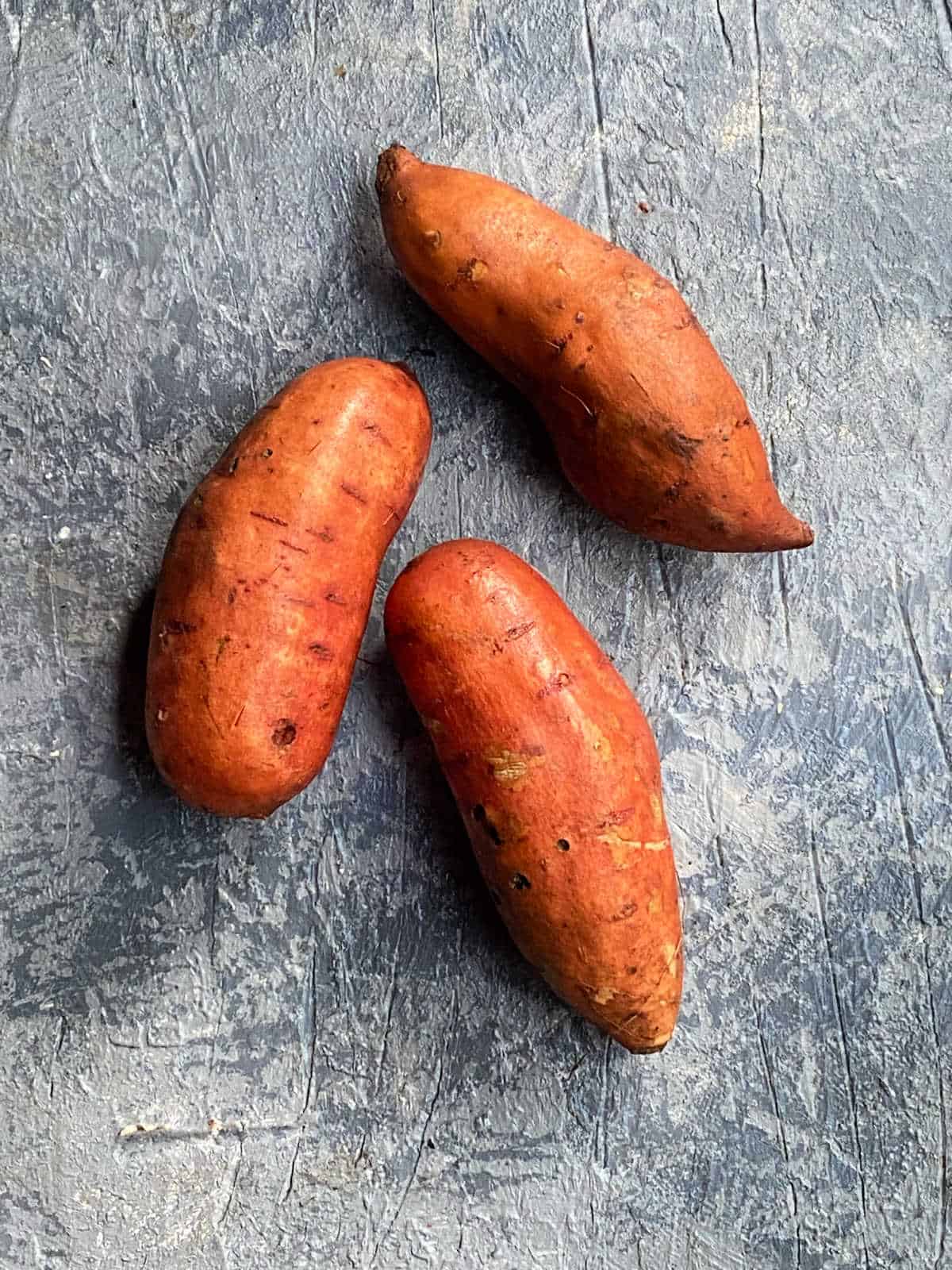 three sweet potatoes