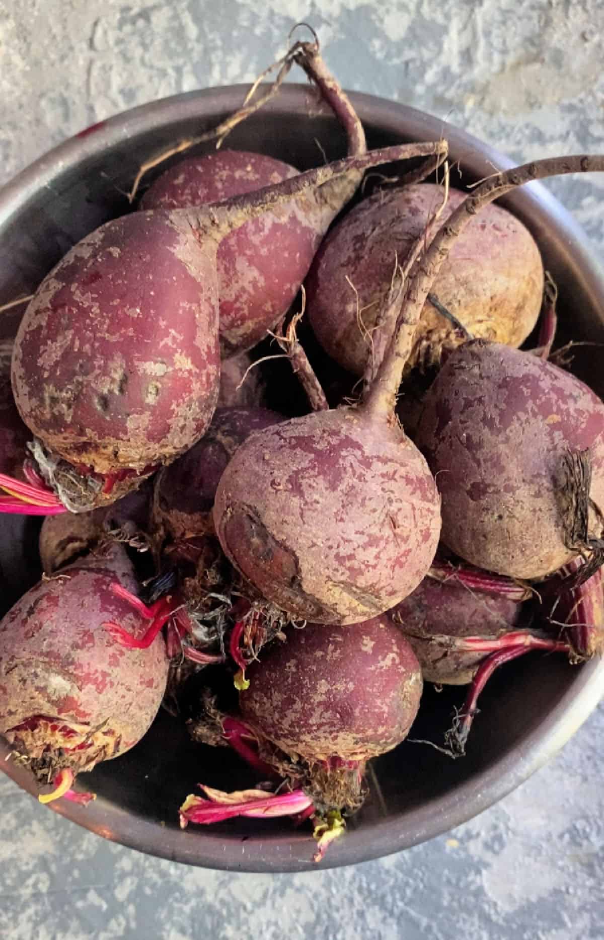 a bowl full of raw beets