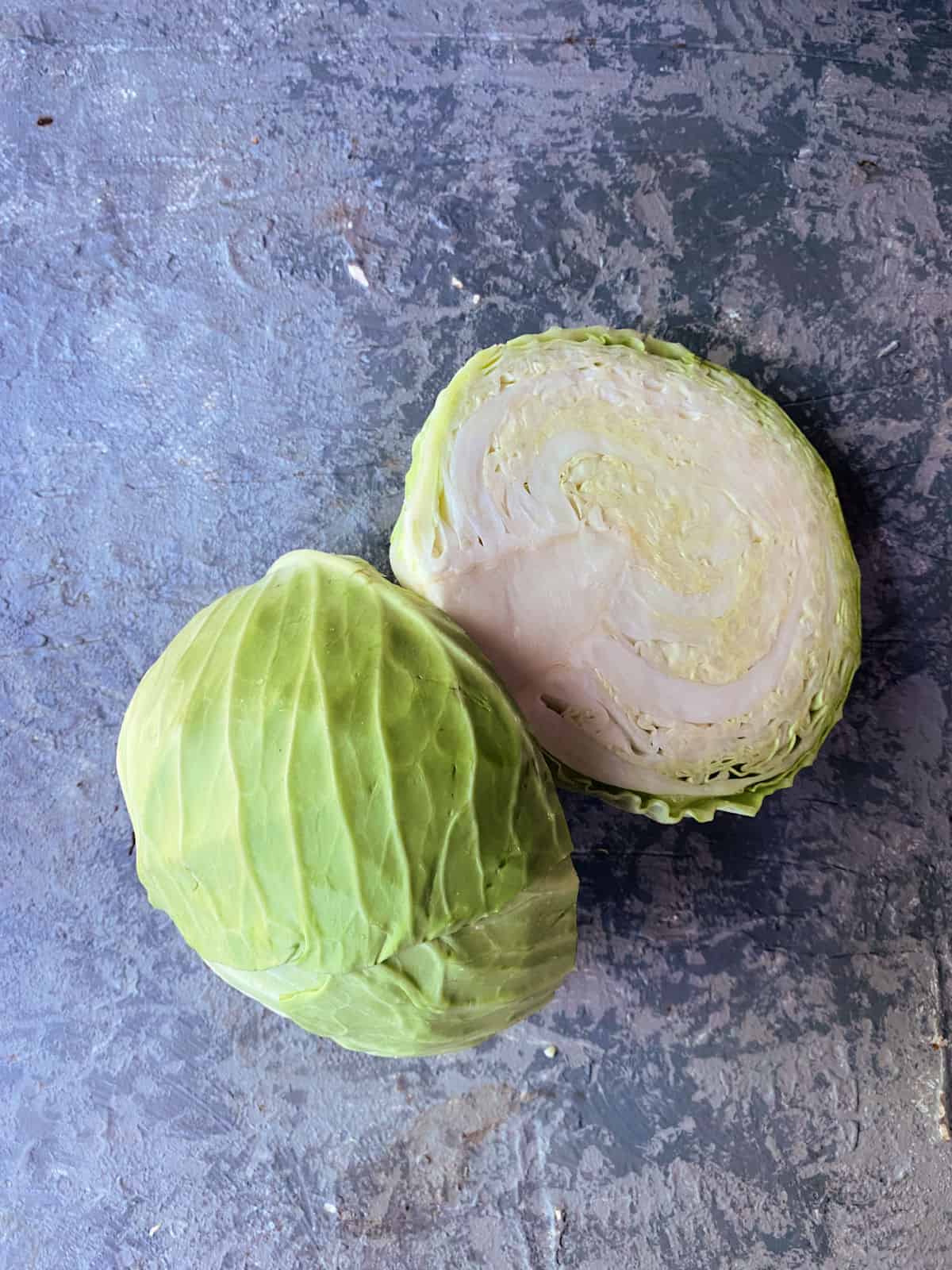 a head of cabbage cut in half
