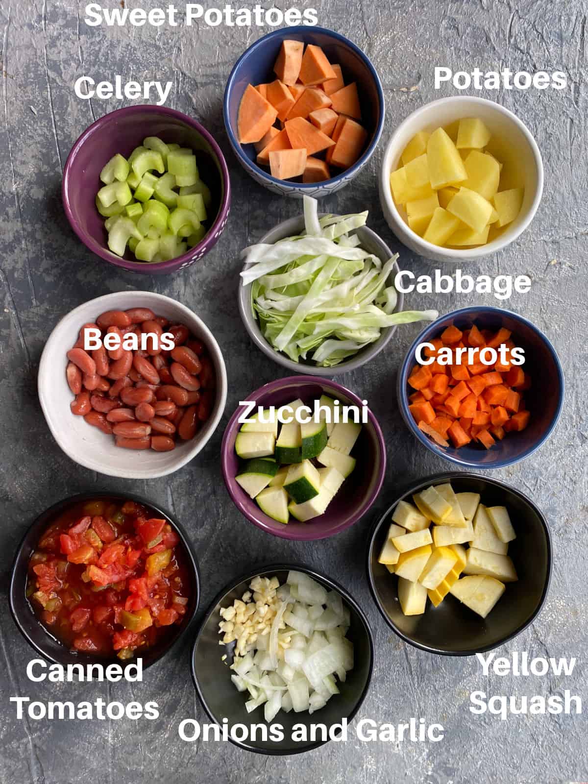 The ingredients to make cabbage soup in small bowls