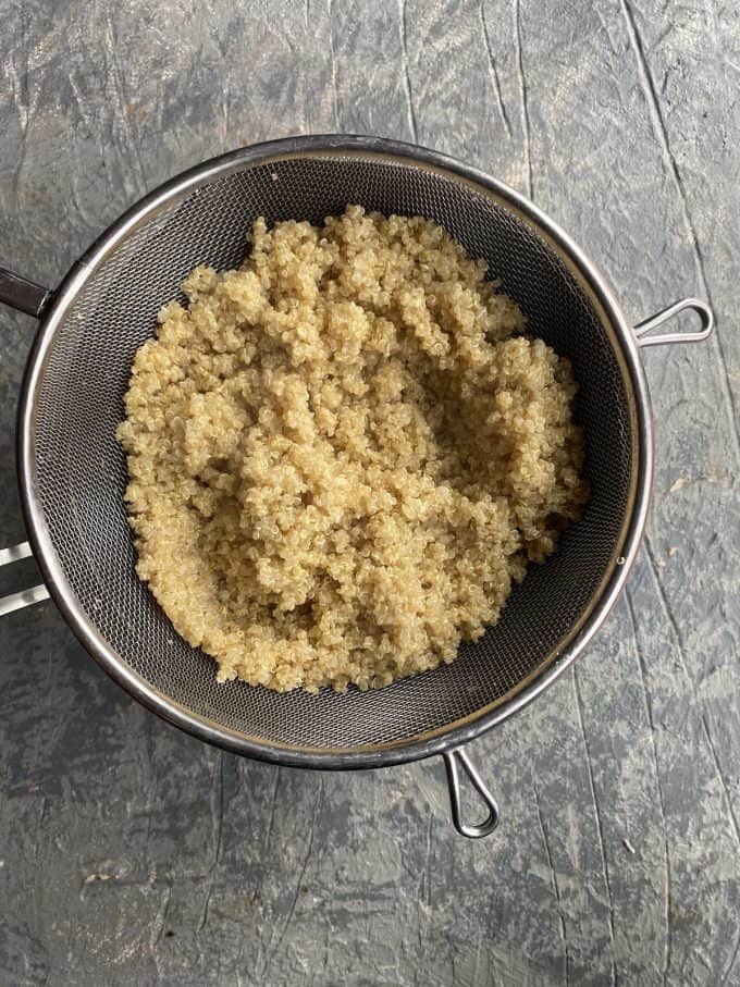 Quinoa strained in a colander