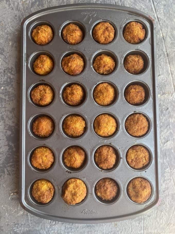 cooked vegan meatballs in a mini muffin tin