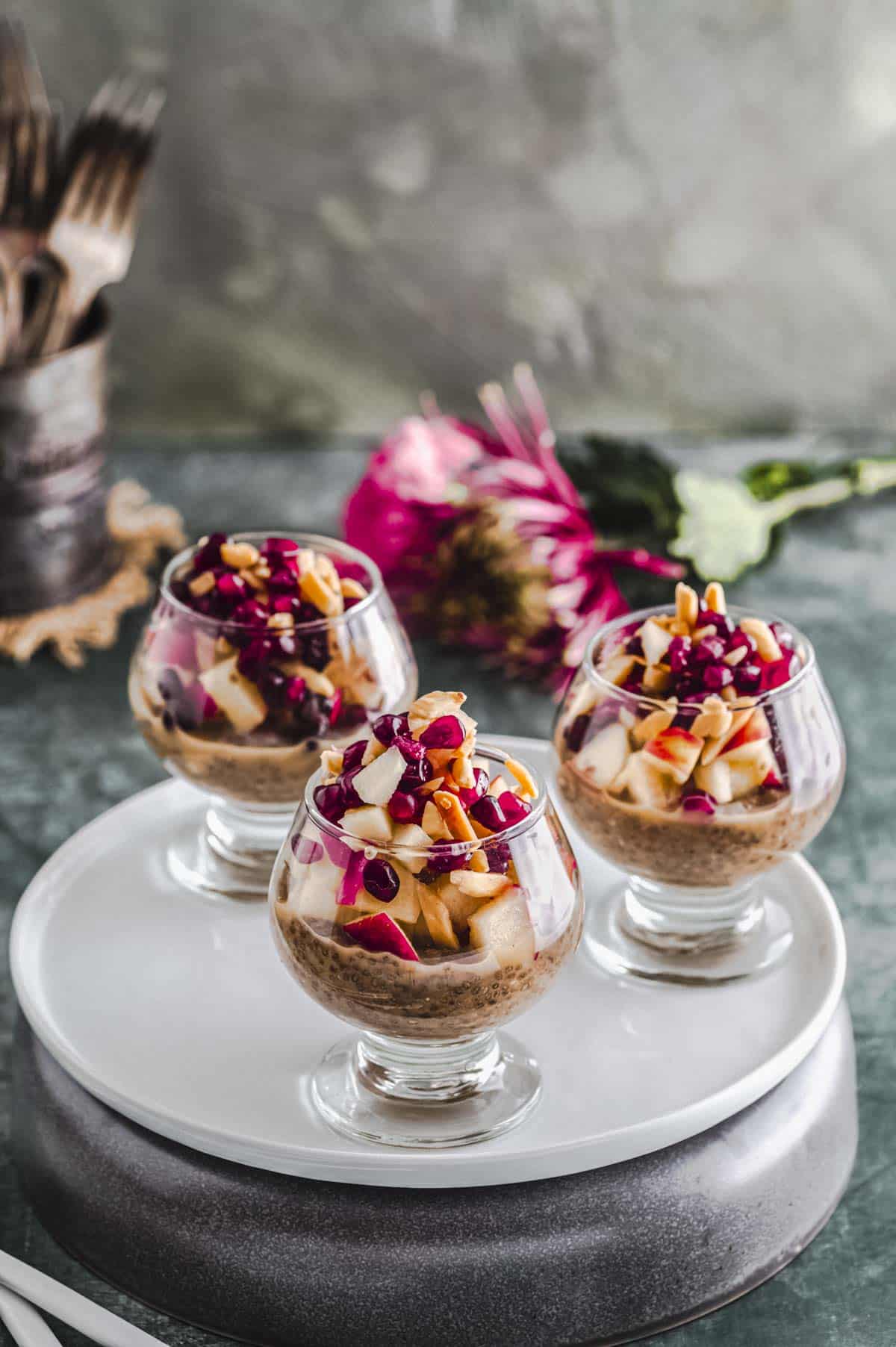 The glass cups with apple pie chia seed pudding