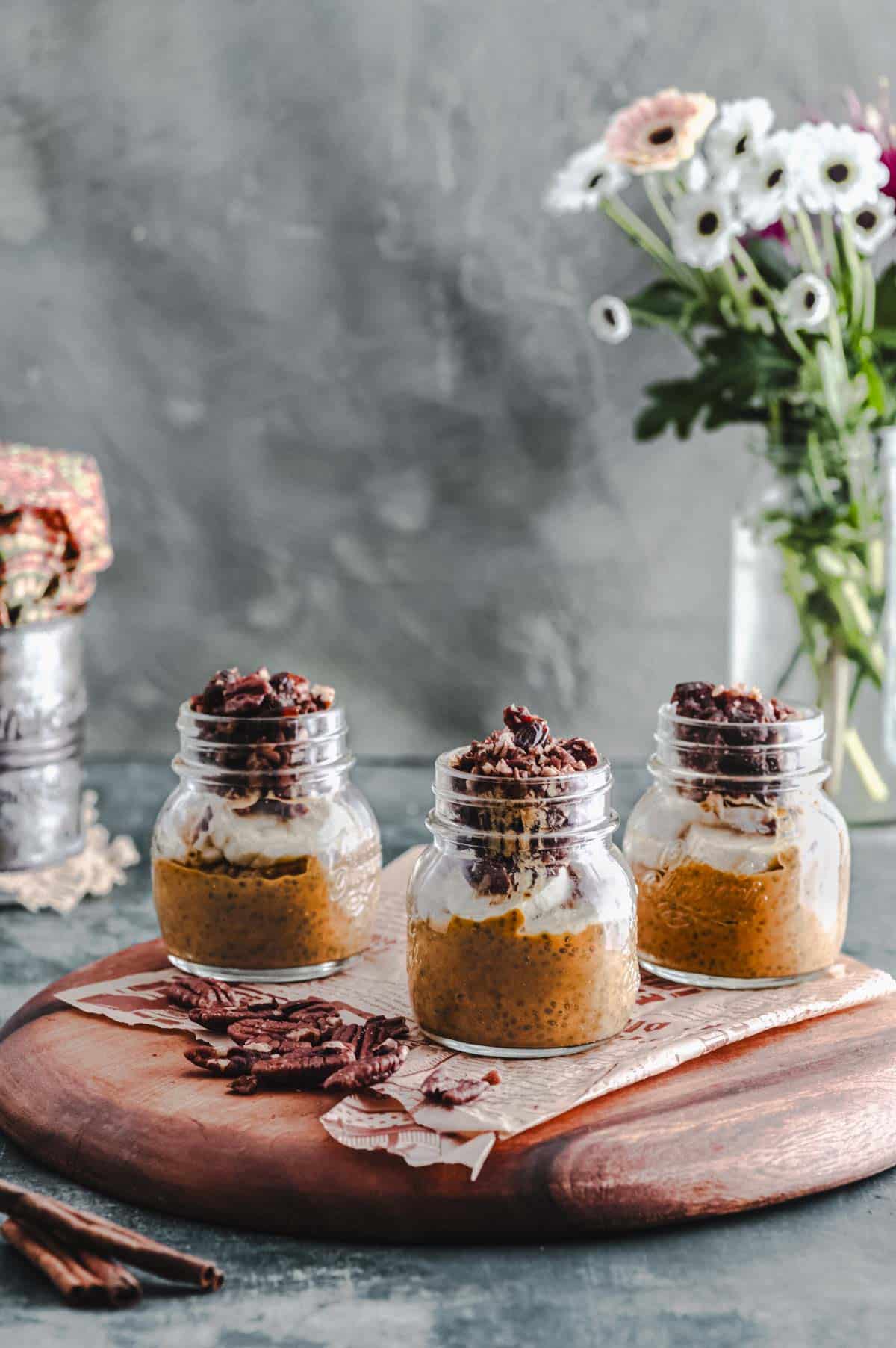 Side View of 3 jars with Pumpkin chia pudding
