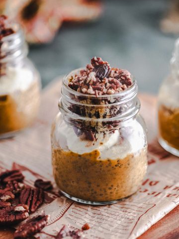 close up view of a jar with pumpkin chia pudding