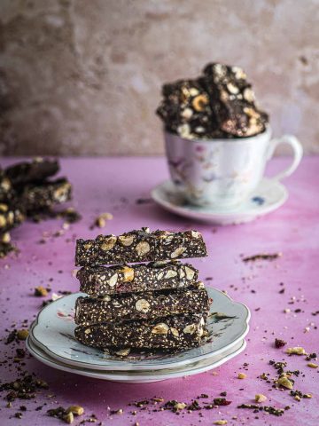 close up view of a plate with piled passover quinoa crunch chocolate bars